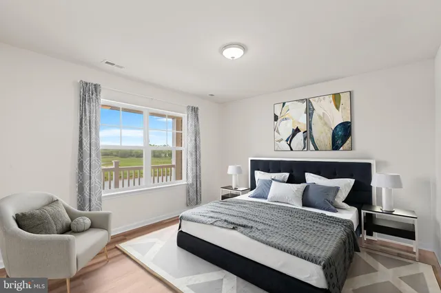 a kitchen with stainless steel appliances granite countertop a refrigerator a stove top oven a sink and dishwasher