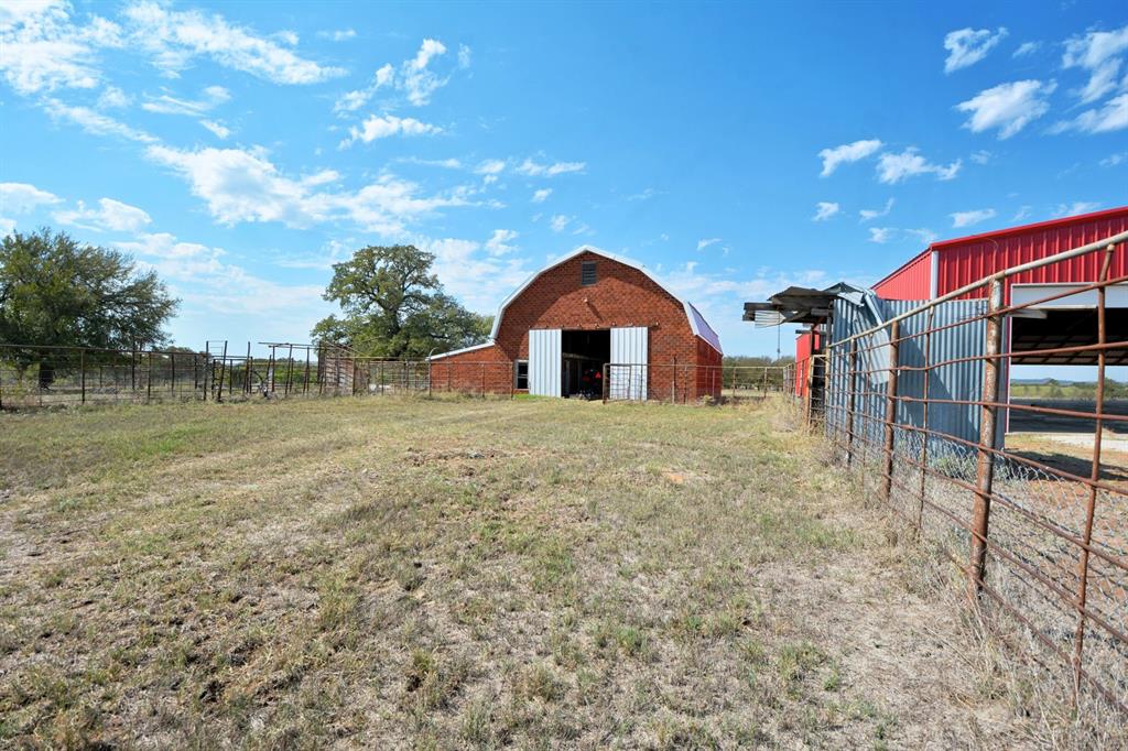 460 Eastside Lake Road Graham, TX 76450 - Photo 12 of 23 a view of a house with a yard