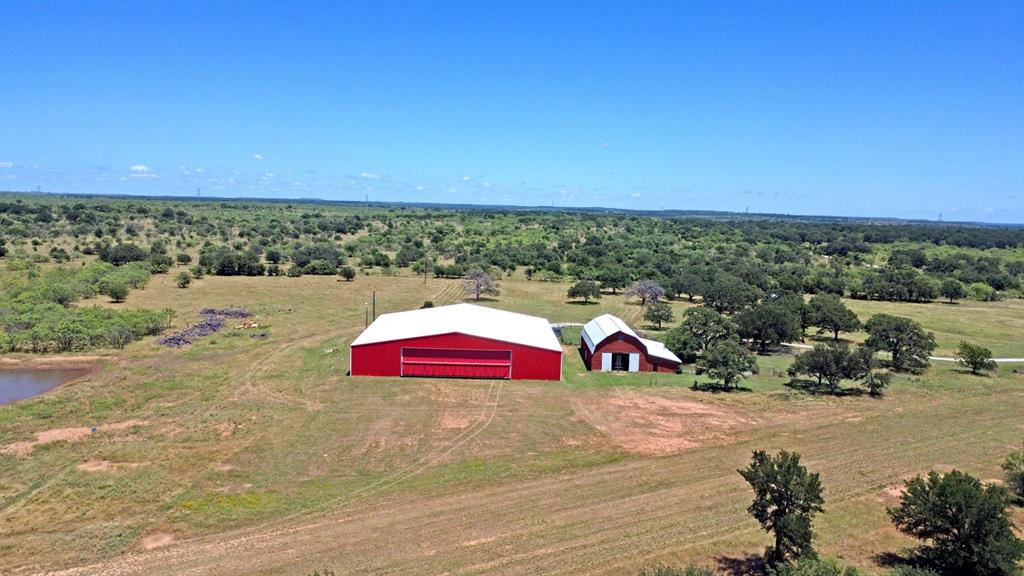 460 Eastside Lake Road Graham, TX 76450 - Photo 14 of 23 a view of roof and a yard