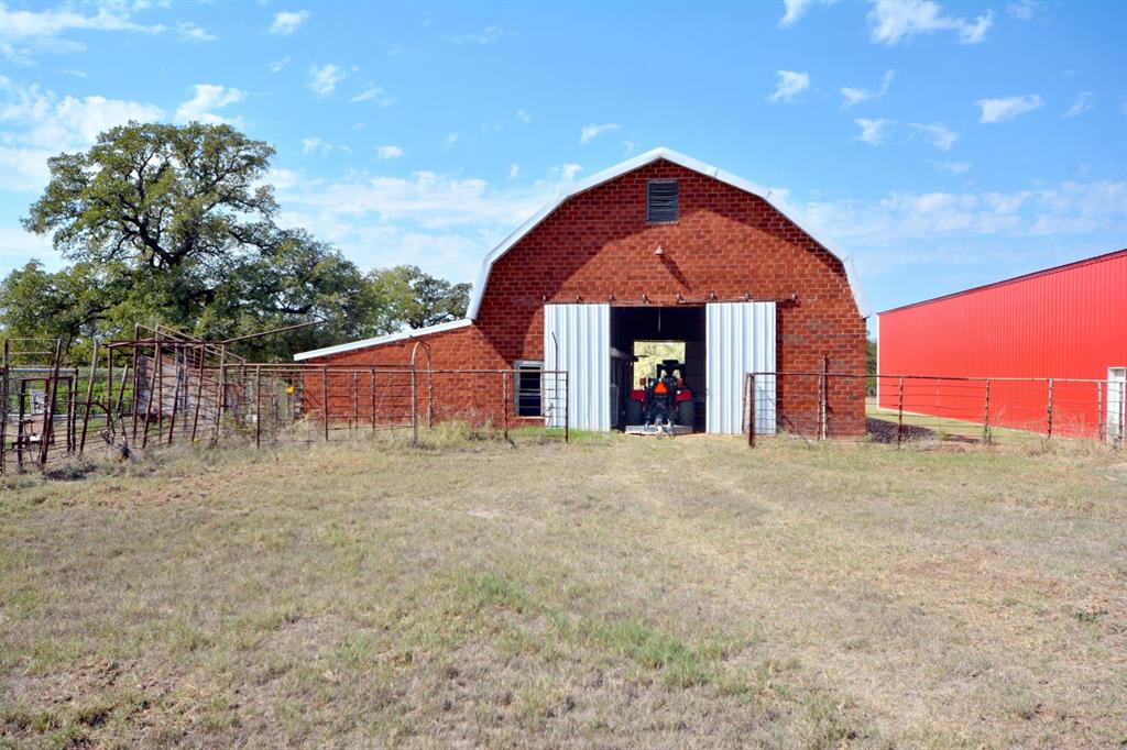 460 Eastside Lake Road Graham, TX 76450 - Photo 10 of 23 a view of a house with a yard