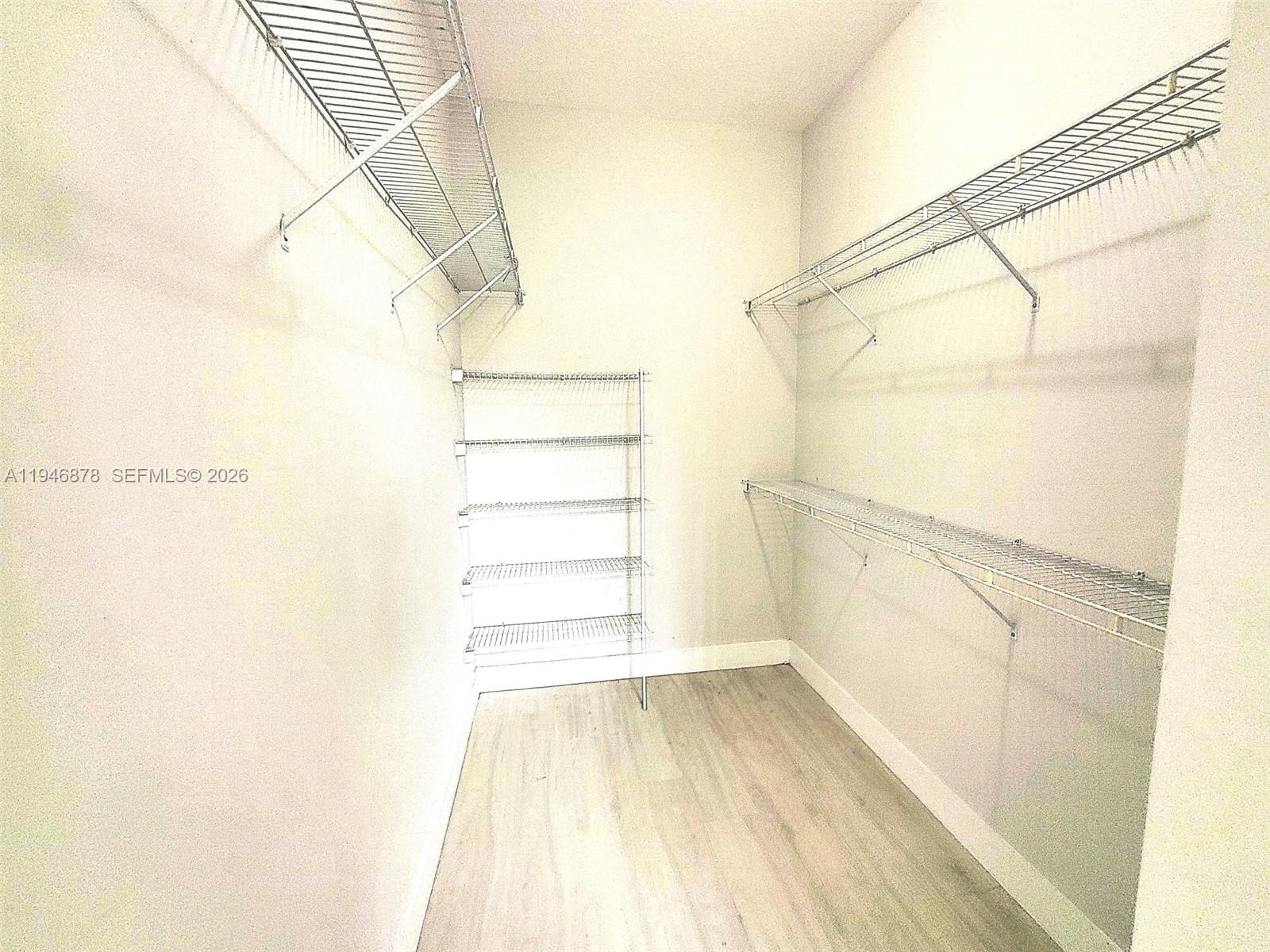 4602 Southwest 160th Avenue, Unit 536 Miramar, FL 33027 - Photo 21 of 30 a view of a room with racks on the wall