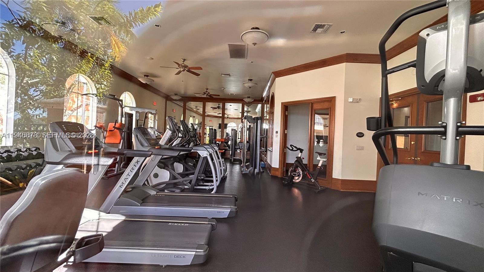 4602 Southwest 160th Avenue, Unit 536 Miramar, FL 33027 - Photo 24 of 30 a view of a room with gym equipment