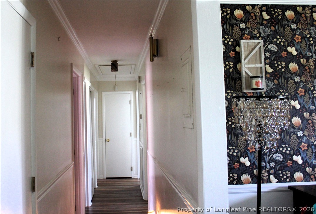 2038 Dunn Road Eastover, NC 28312 - Photo 13 of 29 a view of a hallway with wooden floor and entryway