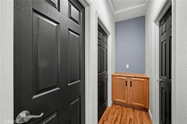 a view of a bathroom from a hallway