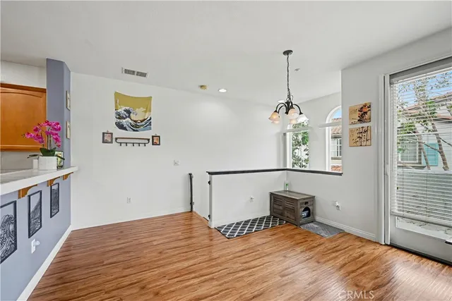 a bedroom with furniture and window