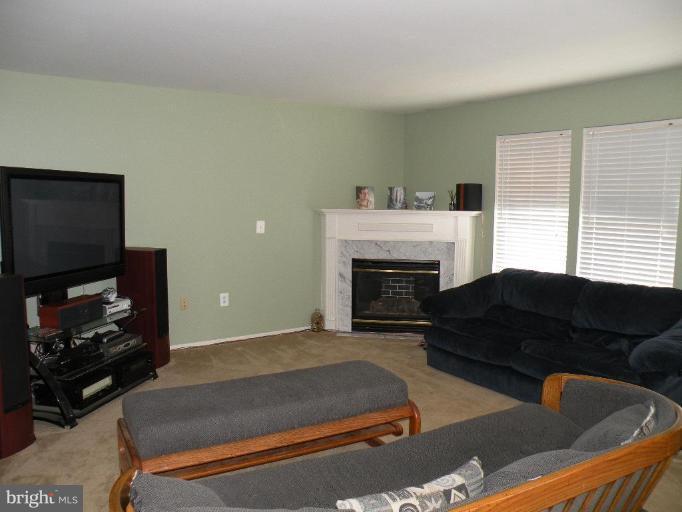 6 Archer Road Fredericksburg, VA 22405 - Photo 6 of 24 Family Room with Gas Fire Open to Kitchen.