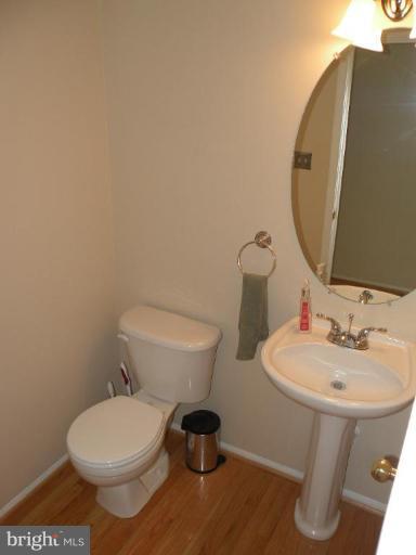 6 Archer Road Fredericksburg, VA 22405 - Photo 9 of 24 Main Level Half Bath with Hardwood.