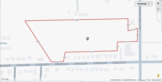 a picture of a bathroom with a shower