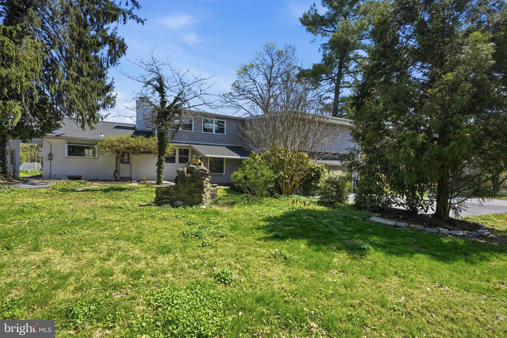 409 South Providence Road Wallingford, PA 19086 - Photo 95 of 106 Charming home nestled in lush greenery.