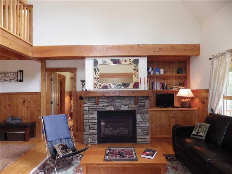 107 Windover Drive Rome, ME 04963 - Photo 7 of 27 Living Room. Playing a game of...
