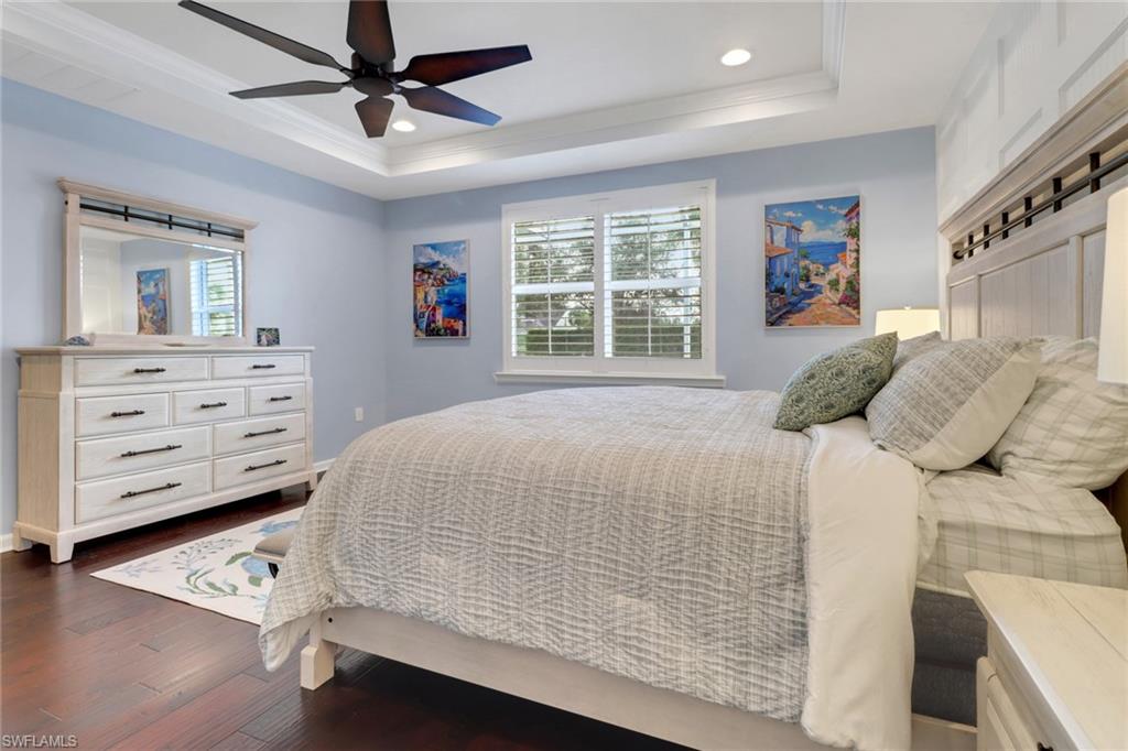 10588 Jackson Square Drive Estero, FL 33928 - Photo 19 of 50 a bedroom with a bed and a window