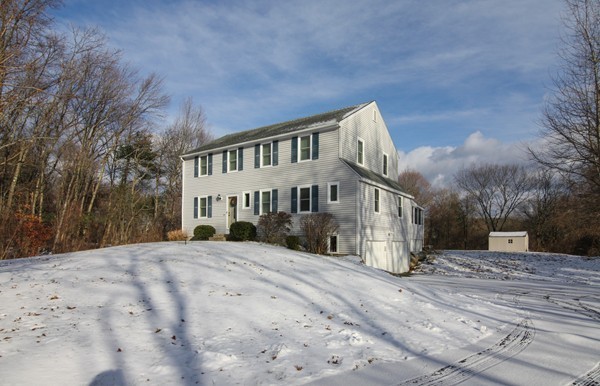 400 Stow Road Boxborough, MA 01719 - Photo 3 of 22 a front view of a house with a yard