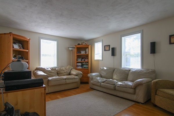 400 Stow Road Boxborough, MA 01719 - Photo 8 of 22 a living room with furniture and a window