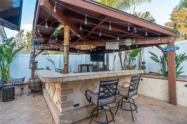 a outdoor space with patio fireplace and furniture