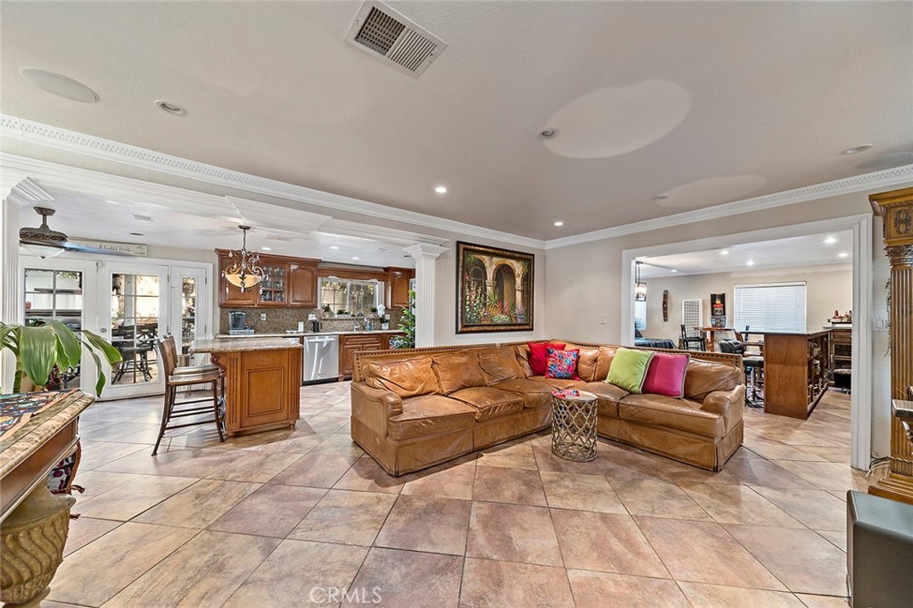 1704 Pass And Covina Road West Covina, CA 91792 - Photo 3 of 29 a living room with furniture and a flat screen tv