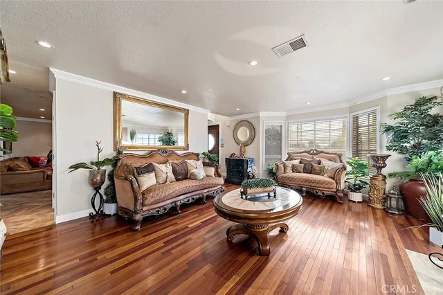a view of a living room and dining room