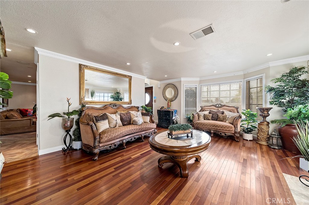 1704 Pass And Covina Road West Covina, CA 91792 - Photo 4 of 29 a living room with furniture and a wooden floor