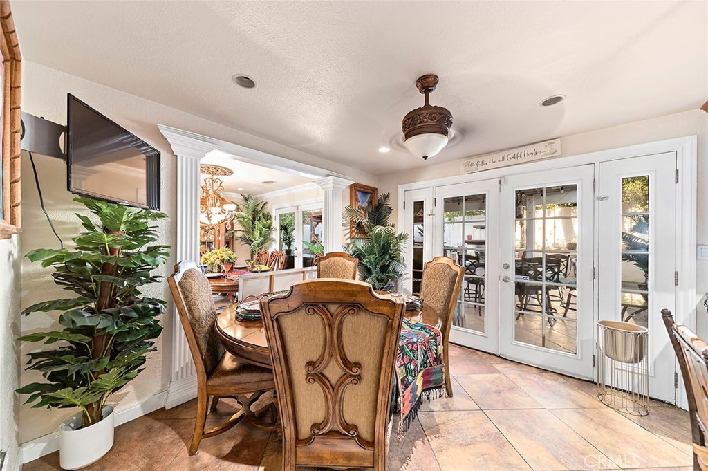 1704 Pass And Covina Road West Covina, CA 91792 - Photo 7 of 29 a dining room with furniture potted plants and wooden floor