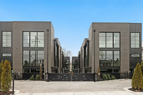 a front view of a building with street view