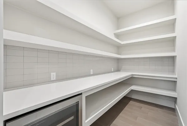 a storage room with washer and dryer