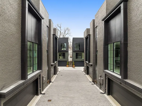 an aerial view of residential houses and outdoor space