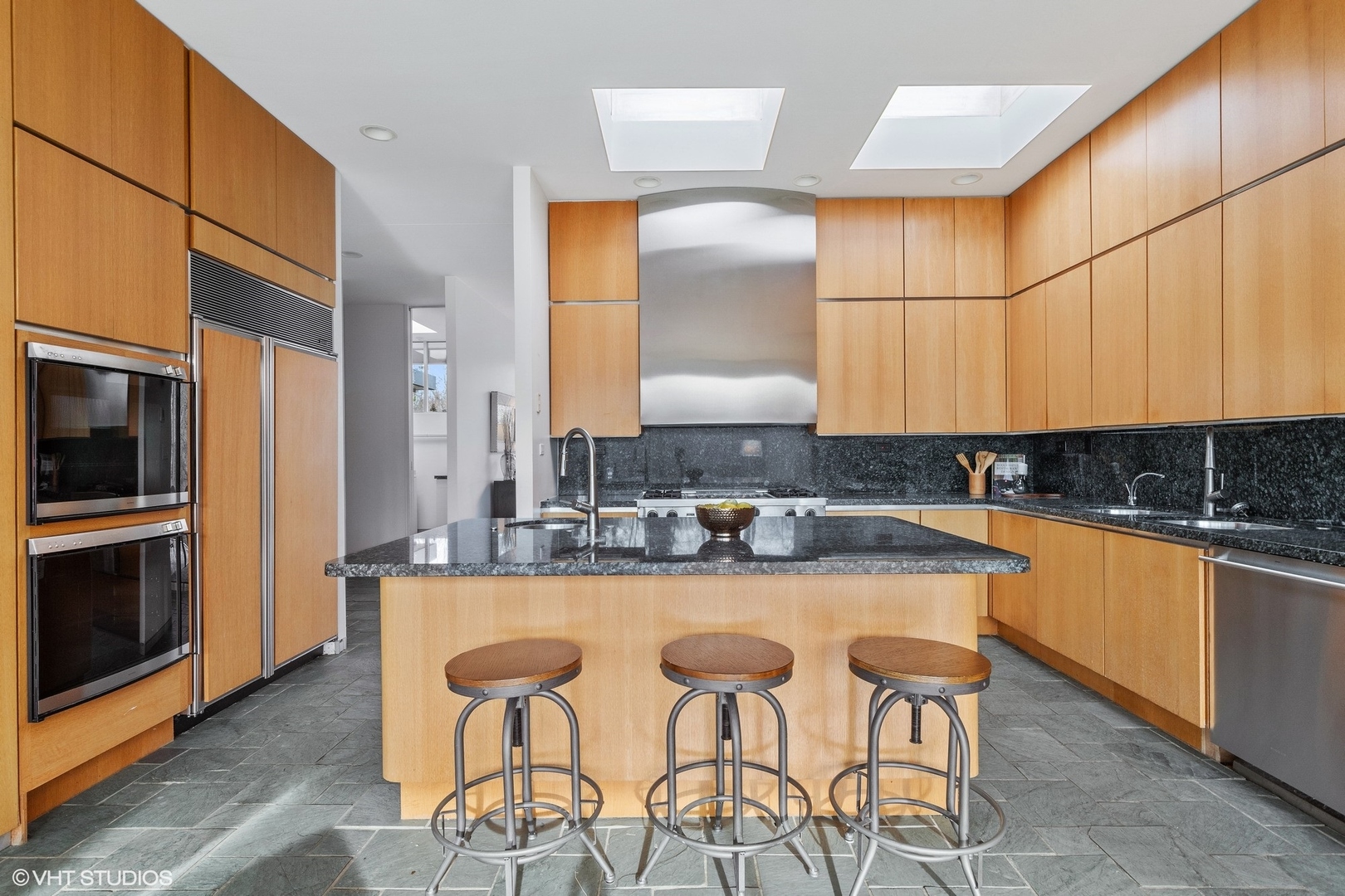 2747 Ridge Road Highland Park, IL 60035 - Photo 11 of 31 a kitchen with stainless steel appliances granite countertop a sink and a stove