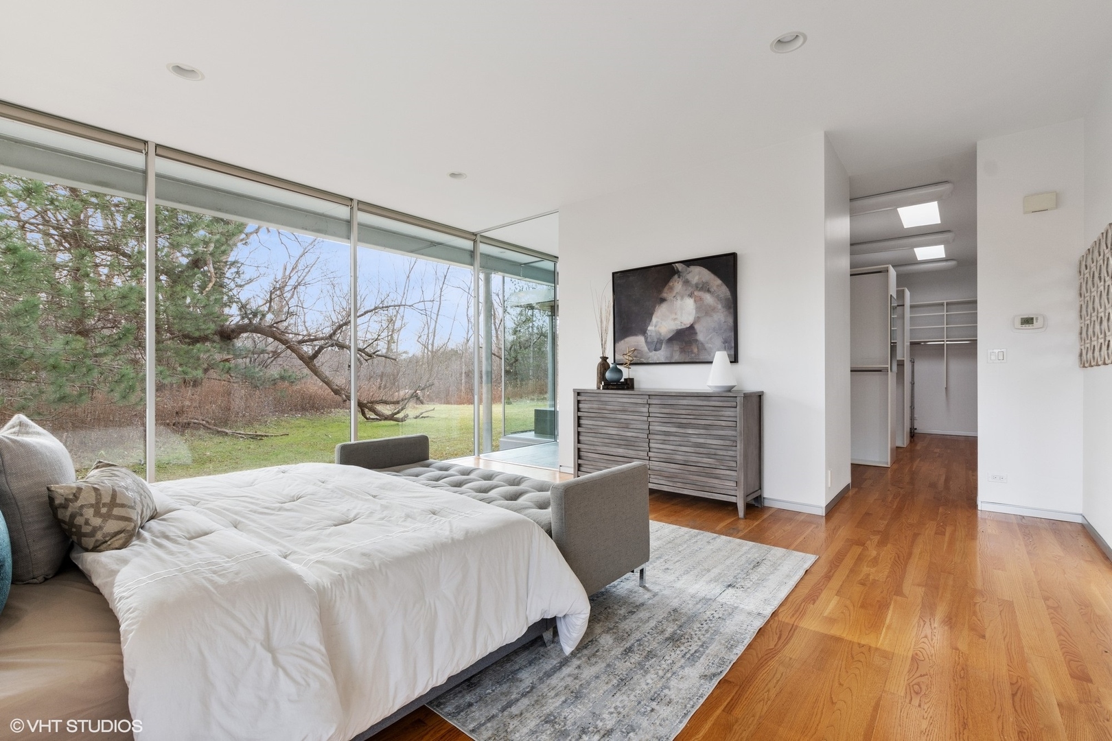 2747 Ridge Road Highland Park, IL 60035 - Photo 15 of 31 a bedroom with a bed and wooden floor