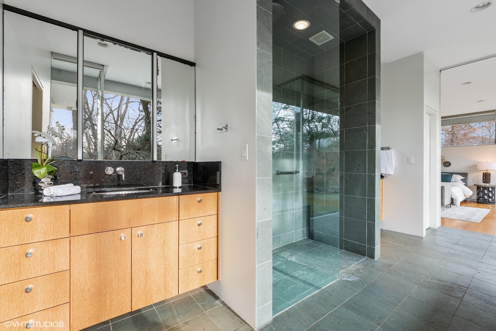 2747 Ridge Road Highland Park, IL 60035 - Photo 17 of 31 a bathroom with a double vanity sink and shower