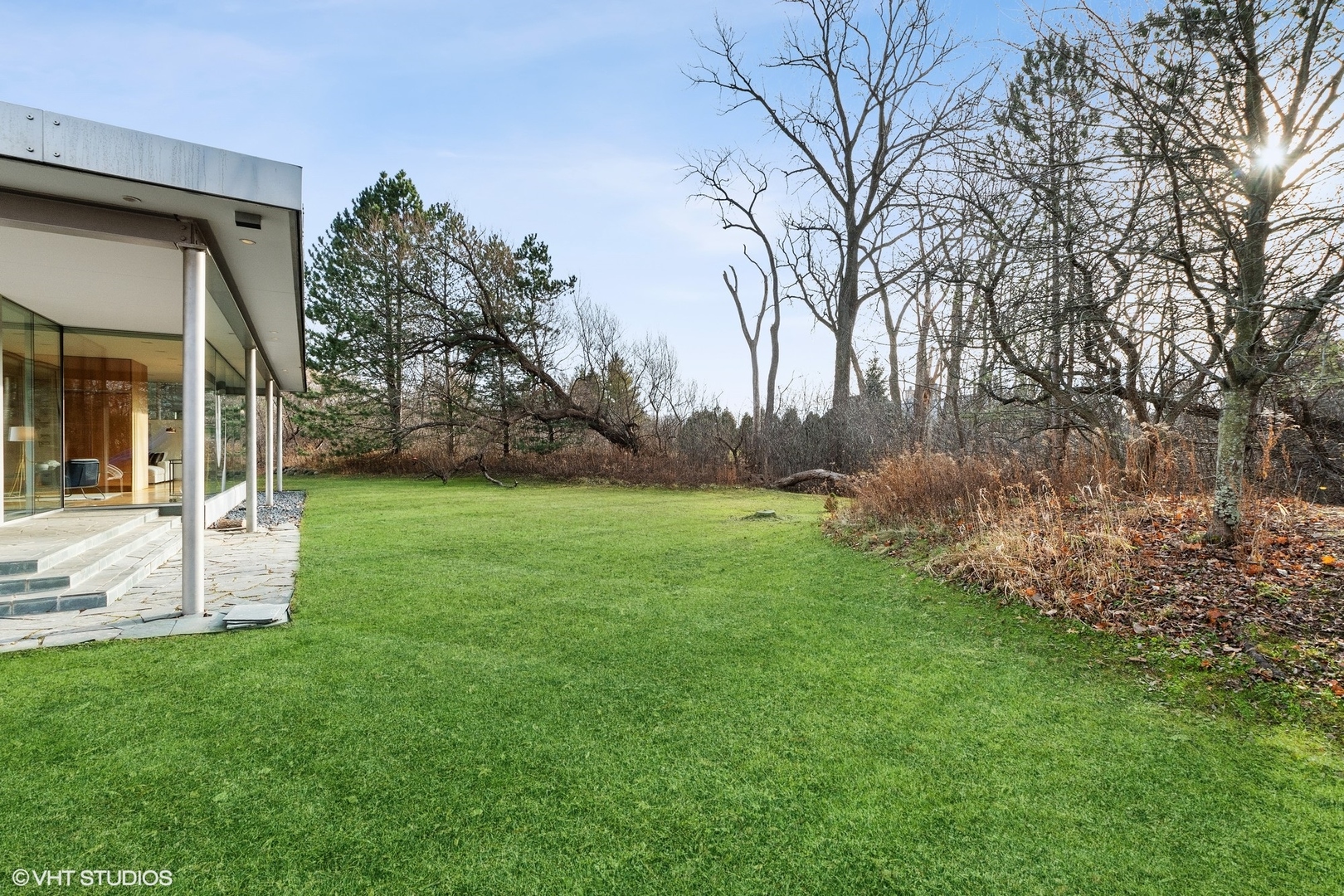 2747 Ridge Road Highland Park, IL 60035 - Photo 26 of 31 a view of a backyard with large trees