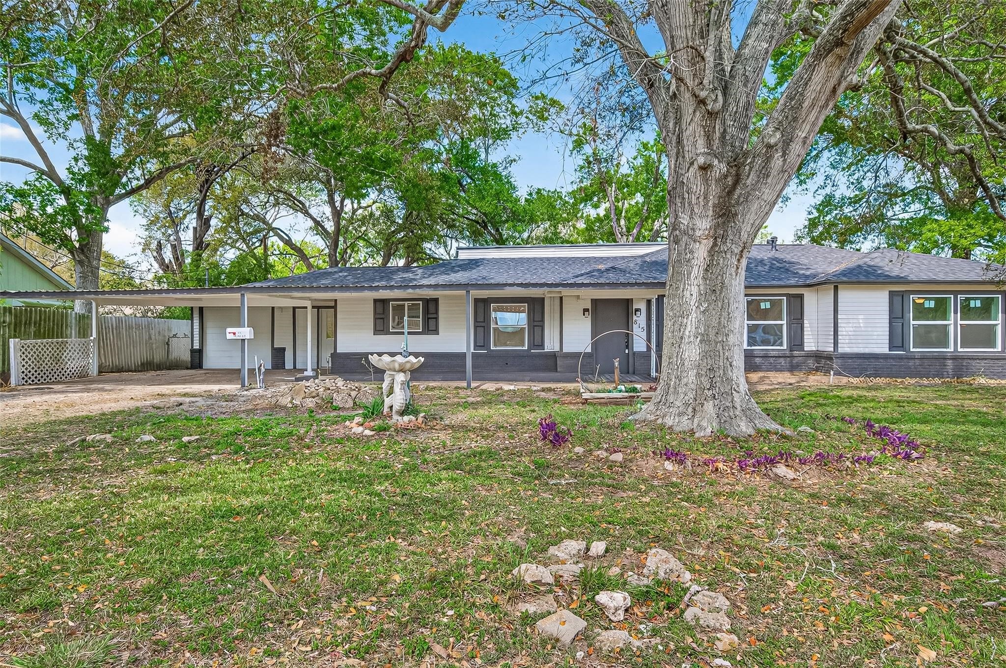 815 Brooks Avenue Rosenberg, TX 77471 - Photo 2 of 48 front view of a house with a yard