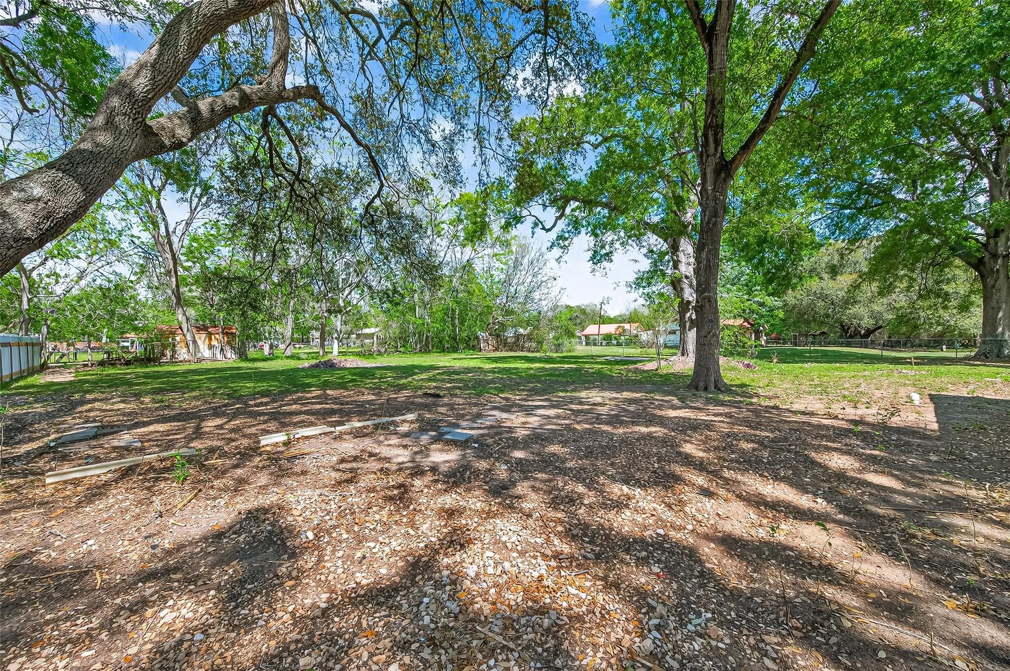 815 Brooks Avenue Rosenberg, TX 77471 - Photo 47 of 48 a view of outdoor space with trees