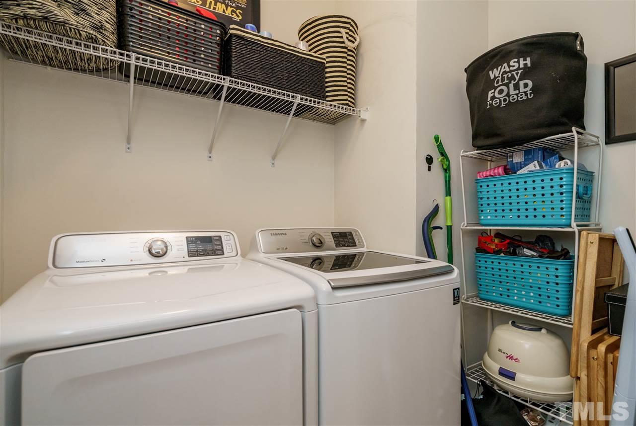 4848 Tommans Trail Raleigh, NC 27616 - Photo 20 of 22 a utility room with dryer and washer