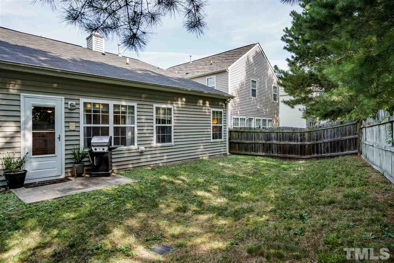 4848 Tommans Trail Raleigh, NC 27616 - Photo 22 of 22 a view of a house with a yard