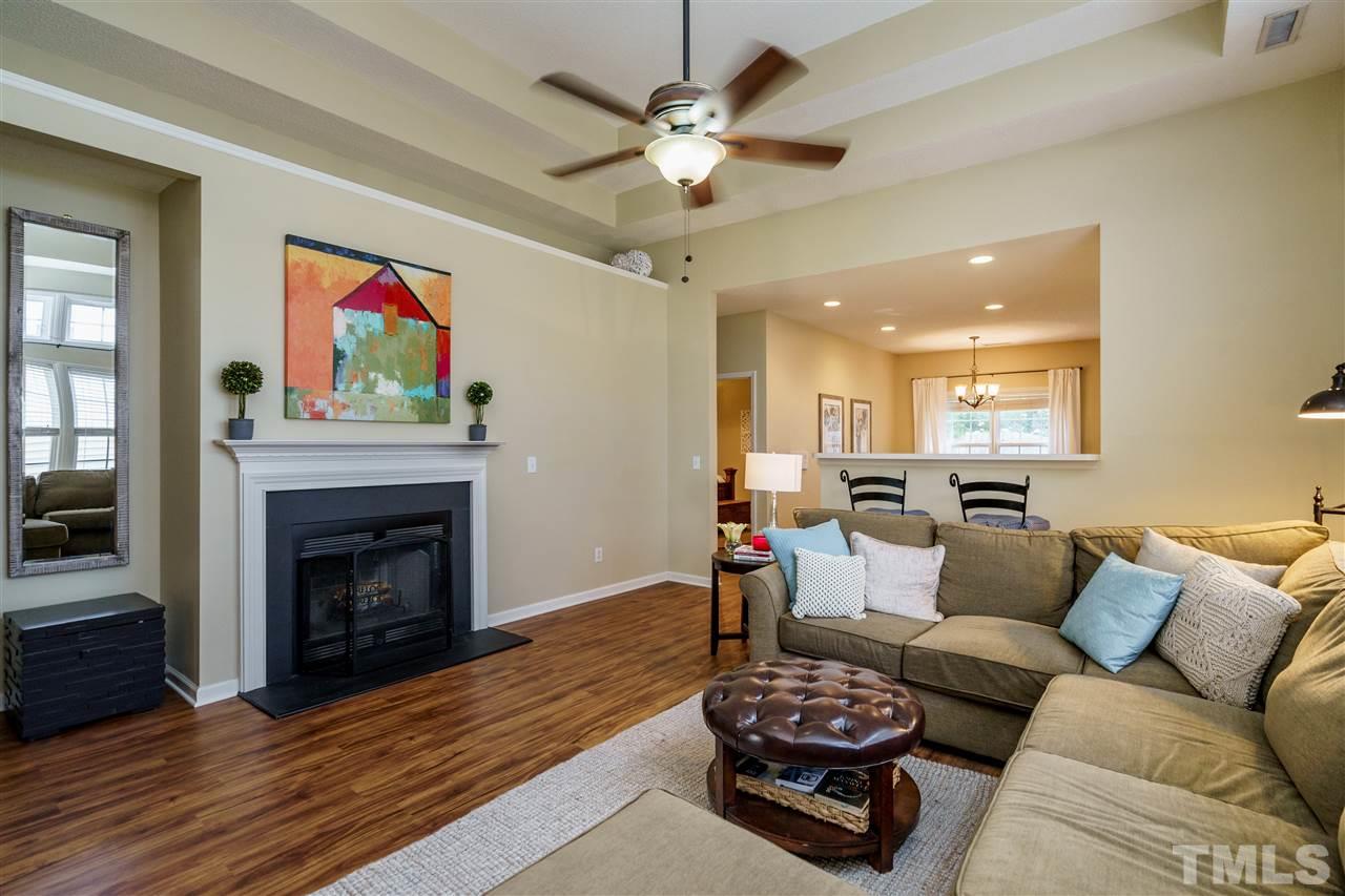 4848 Tommans Trail Raleigh, NC 27616 - Photo 7 of 22 a living room with furniture and a fireplace