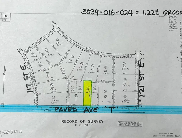 a view of a bench in a yard