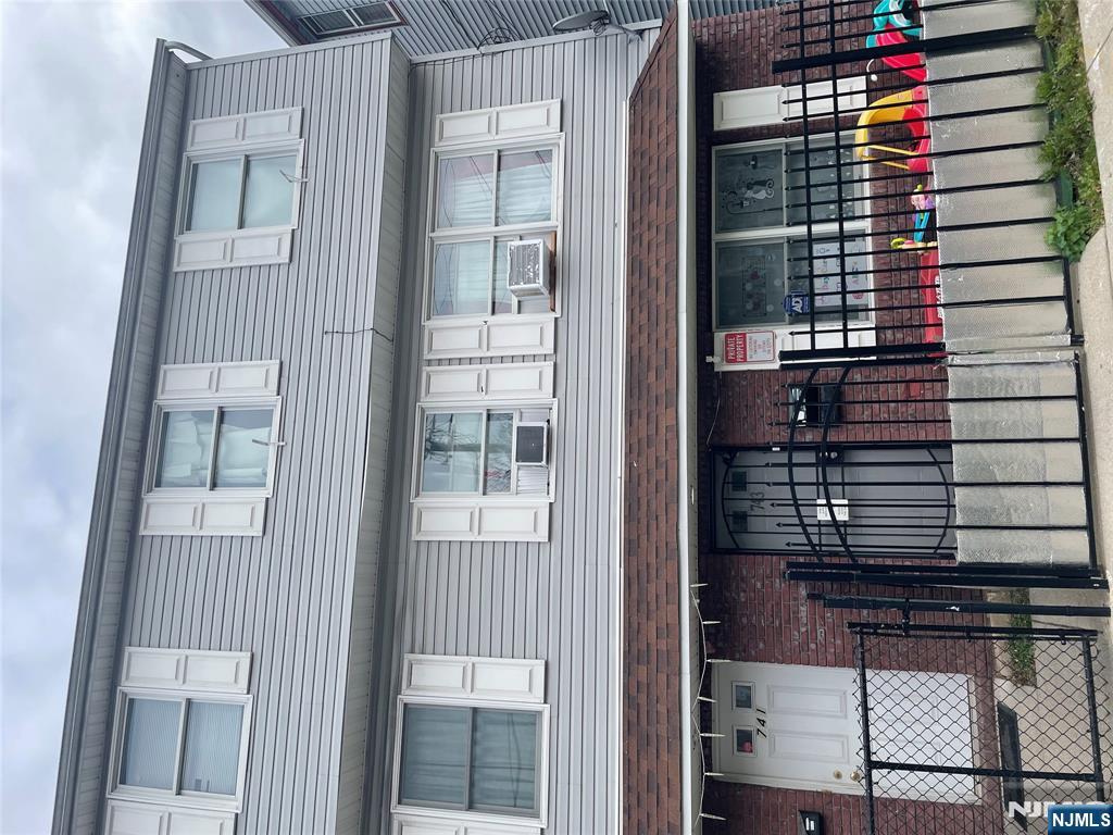 a front view of a house with a balcony