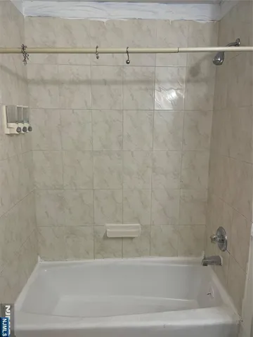 a bathroom with a bathtub