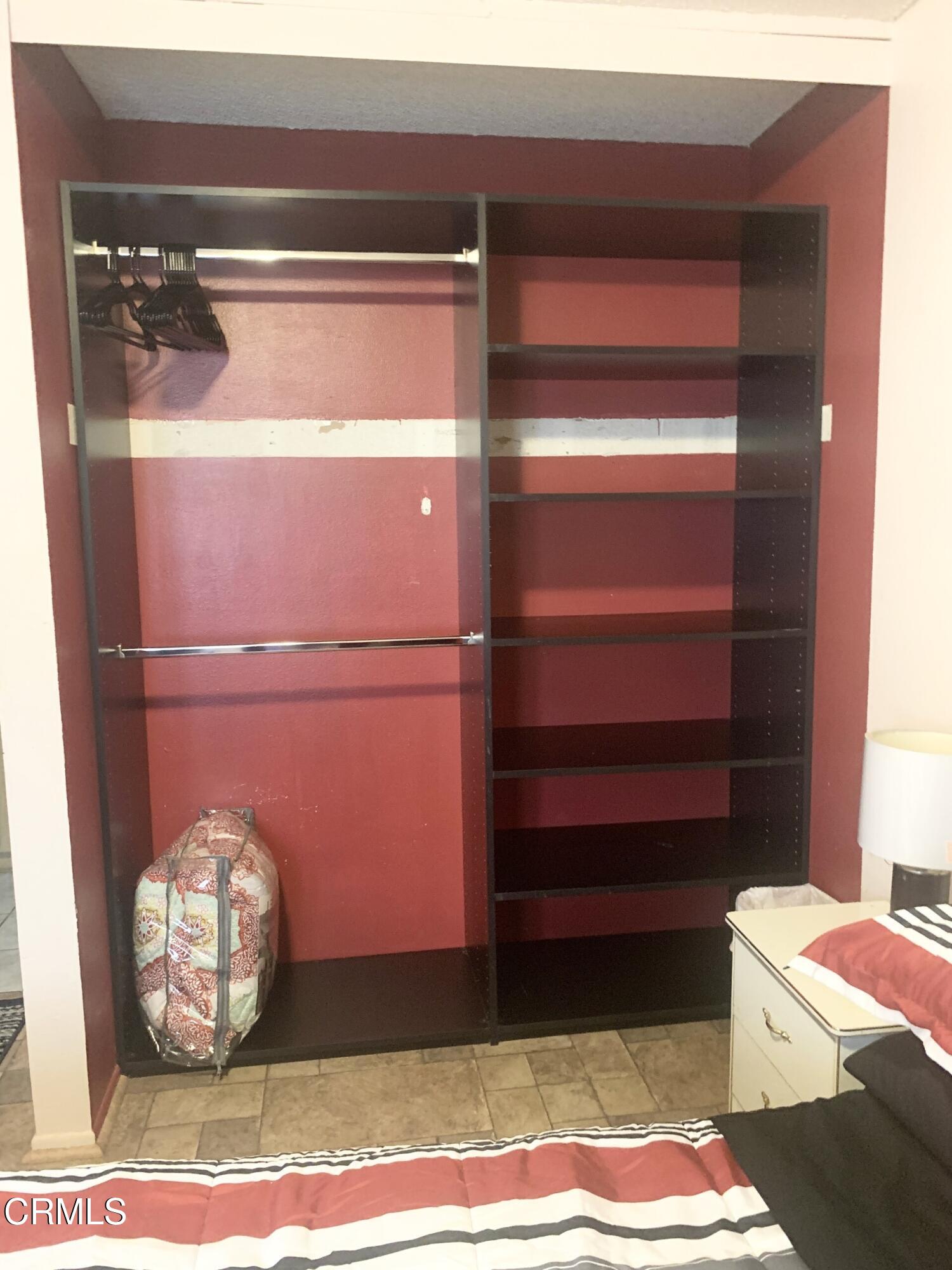 931 Devilfish Drive Oxnard, CA 93035 - Photo 7 of 7 a room with a dresser