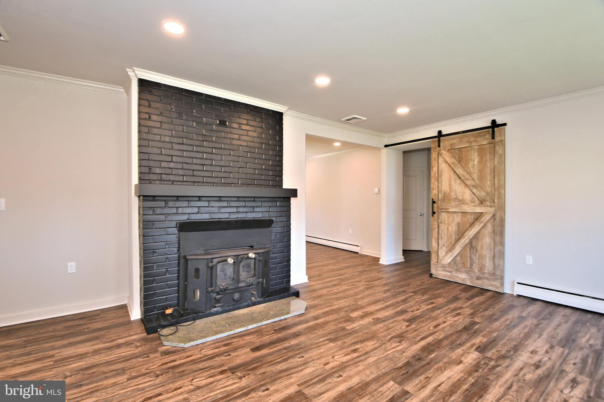 38 Crestview Road Phoenixville, PA 19460 - Photo 5 of 59 Fireplace with wood/coal insert