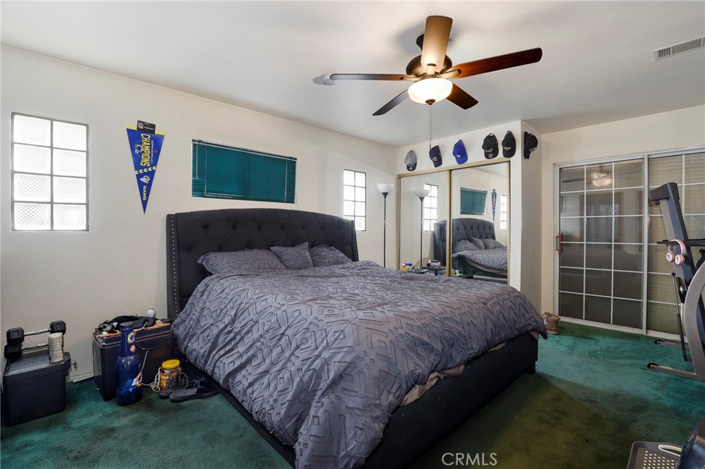 12623 Slater Avenue Compton, CA 90222 - Photo 17 of 35 a bedroom with bed and window