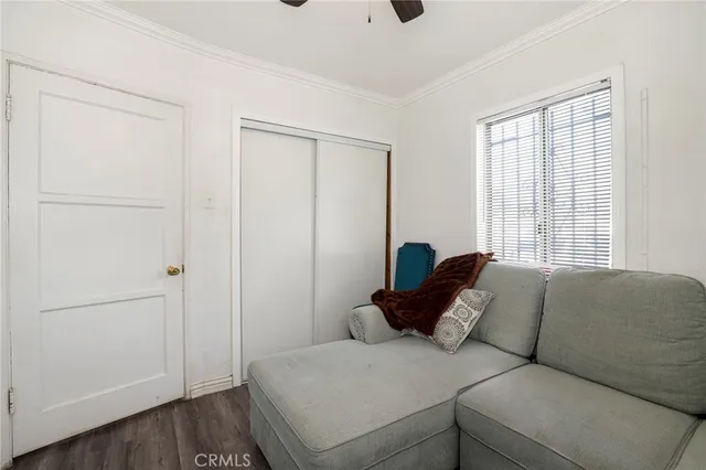 a bed room with a bed and a window