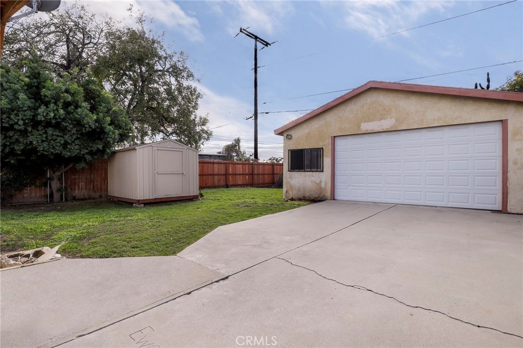 12623 Slater Avenue Compton, CA 90222 - Photo 32 of 35 a view of a house with backyard and garden