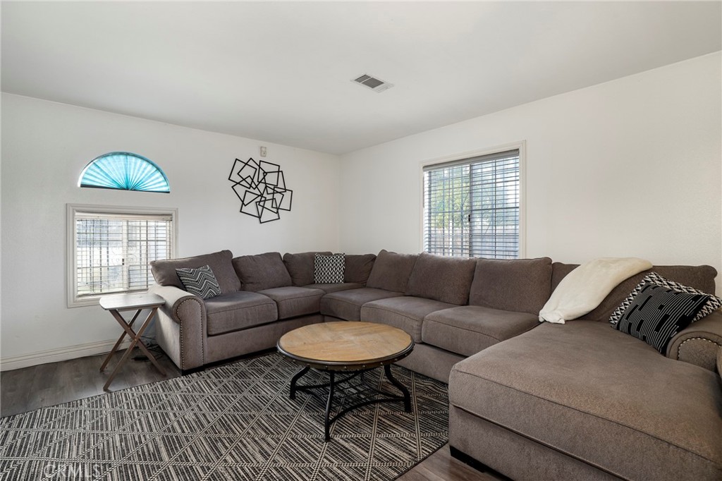 12623 Slater Avenue Compton, CA 90222 - Photo 4 of 35 a living room with furniture and a window