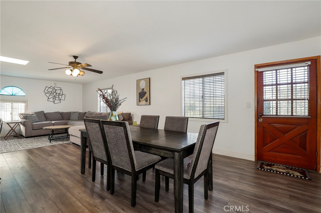 12623 Slater Avenue Compton, CA 90222 - Photo 8 of 35 a view of a a dining room with furniture window and wooden floor