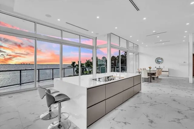 a bathroom with a sink toilet a mirror and shower