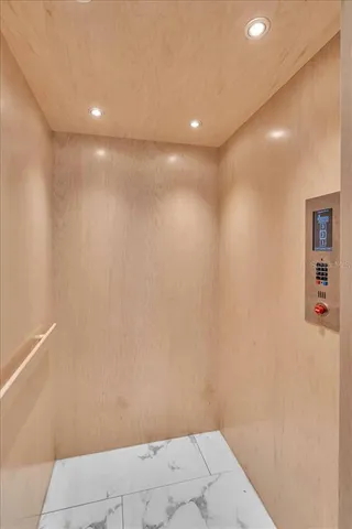 a view of a swimming pool with a yard