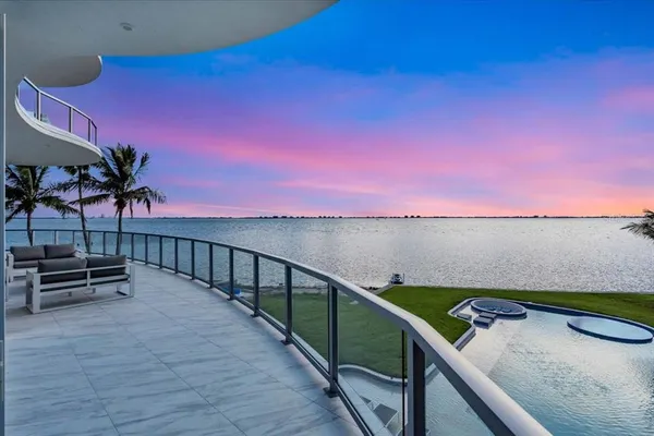 a view of a balcony with an outdoor space