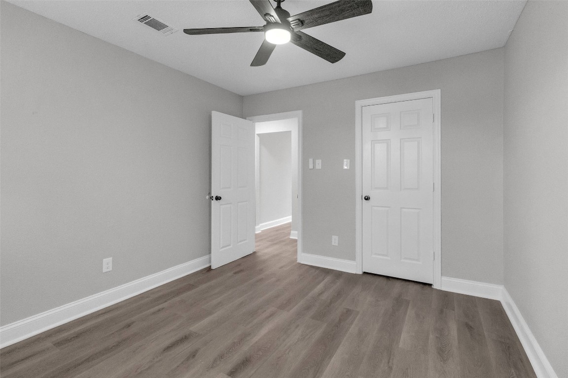 3613 Crane Street Houston, TX 77026 - Photo 12 of 23 a view of an empty room and wooden floor