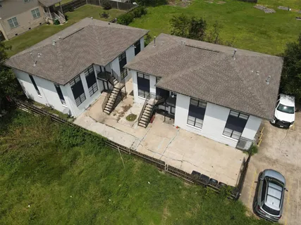 an aerial view of a house with garden