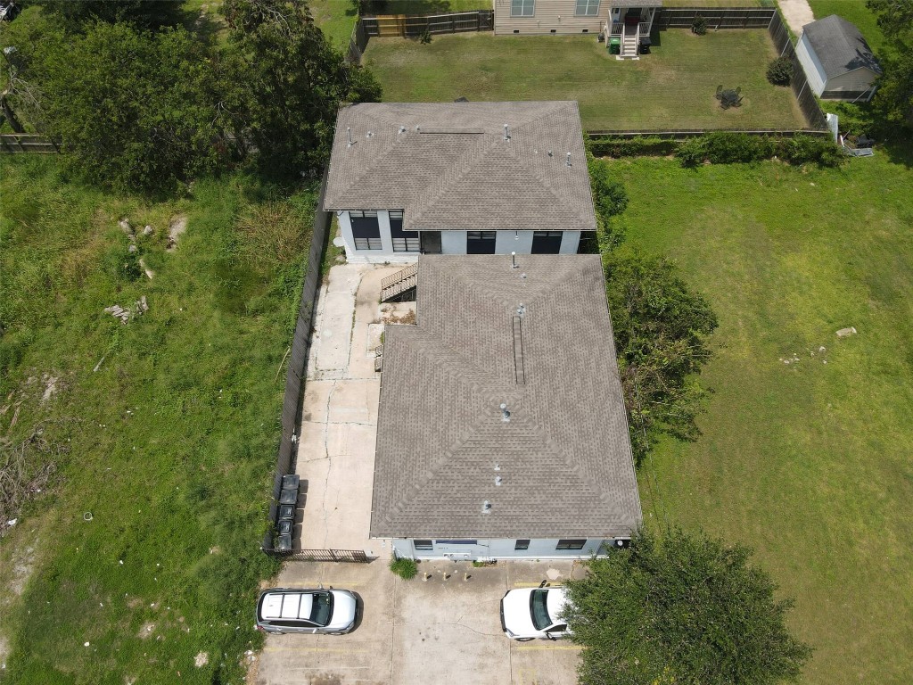 3613 Crane Street Houston, TX 77026 - Photo 23 of 23 an aerial view of a house with a yard and lake view